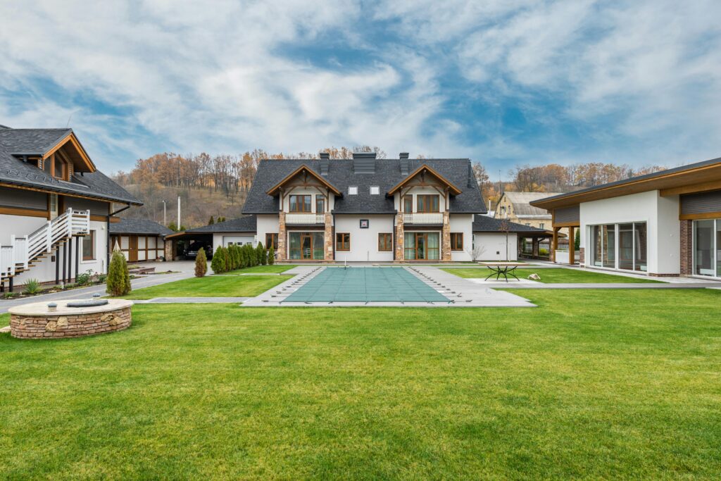 Farmhouse surrounded by lush fruit plantations.